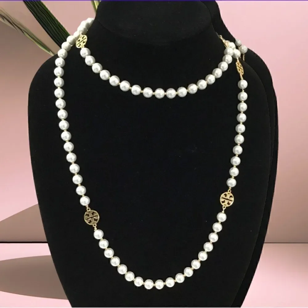 TORY BURCH PEARLS LOGO LONG NECKLACE
